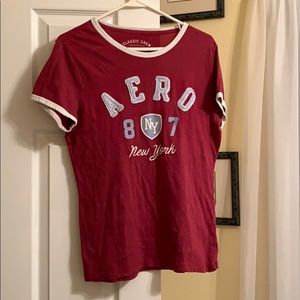 Red, white, and light blue Aéropostale t-shirt